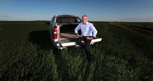 PHIL HOSSACK / WINNIPEG FREE PRESS -  VOLUNTEER - Art Enns poses in a field of oats, he'll donate 25 of the 100 acre's proceeds to charity. See story. June 16, 2016