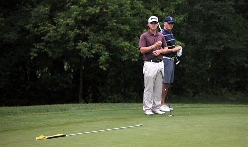 PHIL HOSSACK / WINNIPEG FREE PRESS -  PLAYERS CUP - Tour golfer Aaron Cockerill  and Players Cup Exec Director Ryan Hart (right) cast a critical eye over the 5th green at Niakwa Country Club Friday morning. See Tim Campbell's story. June 17, 2016
