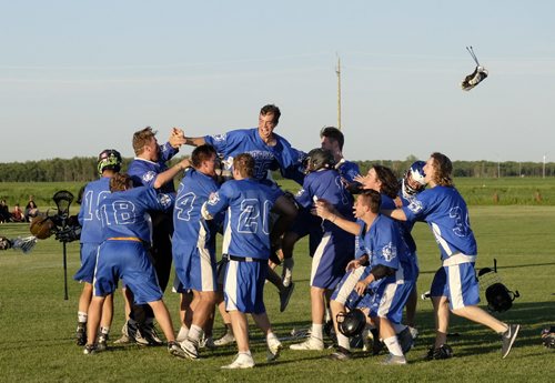 ZACHARY PRONG / WINNIPEG FREE PRESS  The River East Kodiaks celebrate their victory over the Garden City Fighting Gophers in the division high school championship game.