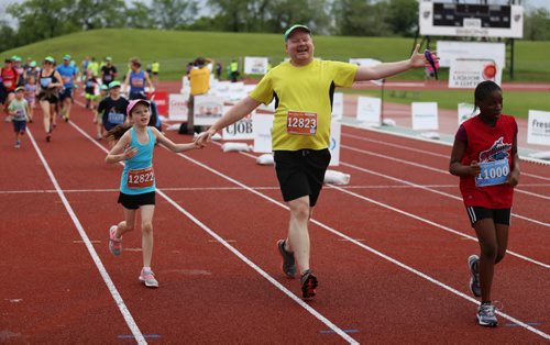 TREVOR HAGAN / WINNIPEG FREE PRESS 2016 Manitoba Marathon super run participants near the finish line at the University of Manitoba, Sunday, June 19, 2016.