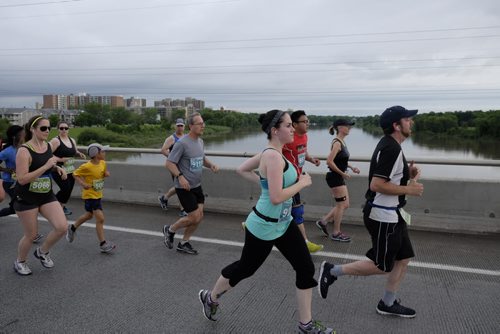 ZACHARY PRONG / WINNIPEG FREE PRESS  Runners cross the Bishop Grandin Blvd Bridge during the Manitoba Marathon on June 19, 2016.