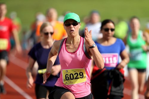 TREVOR HAGAN / WINNIPEG FREE PRESS 2016 Manitoba Marathon half marathon participant Sheila Wiebe of Sperling, MB near the finish line, Sunday, June 19, 2016.