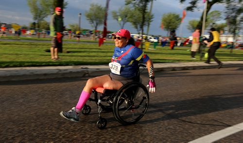 TREVOR HAGAN / WINNIPEG FREE PRESS 2016 Manitoba Marathon wheelchair participant Kerri McKee of Steinbach leaves the start line at the University of Manitoba, Sunday, June 19, 2016.
