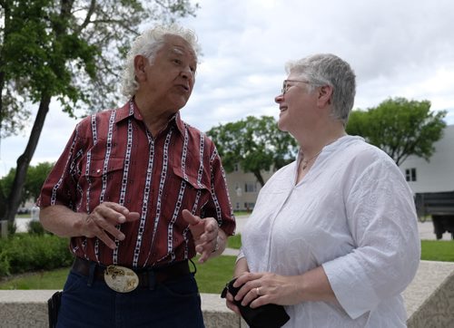 ZACHARY PRONG / WINNIPEG FREE PRESS  Herb Wells and Lorraine Iverach enjoy a moment during a ceremony marking the bicentennial of the Battle of Seven Oaks on June 19, 2016. Wells and Iverach had a chance encounter before the ceremony and discovered they share a great-great-great grandfather who fought in the battle. (See story by Aidan for details)
