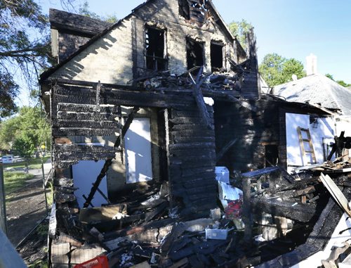 WAYNE GLOWACKI / WINNIPEG FREE PRESS   A house in the 1200 block of Manitoba Ave. at McNichol St. was damage by a fire that started Sunday night.   June 20  2016