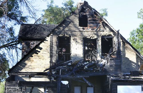 WAYNE GLOWACKI / WINNIPEG FREE PRESS   A house in the 1200 block of Manitoba Ave. at McNichol St. was damage by a fire that started Sunday night.   June 20  2016