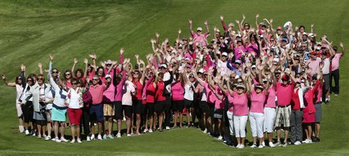 WAYNE GLOWACKI / WINNIPEG FREE PRESS   Participants in the 20th Annual Pink Ribbon Ladies Golf Classic For Hope pose in the shape of a giant pink ribbon for a group photo before teeing off at the Niakwa Country Club Monday morning. The fundraising event for CancerCare Manitoba Breast and Gyne Cancer Centre of Hope attracted 144 golfers, 36 male caddies and 60 volunteers this year. Doug Speirs story  June 20  2016