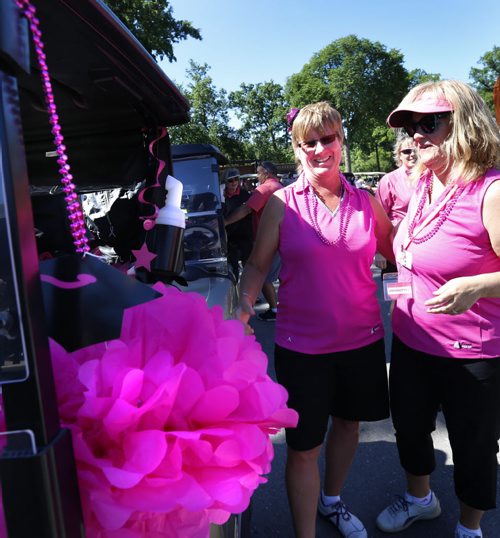 WAYNE GLOWACKI / WINNIPEG FREE PRESS   Golfers Cindy Carlson and Cathy Lantz, right, at the start of the 20th Annual Pink Ribbon Ladies Golf Classic For Hope at the Niakwa Country Club Monday morning. The fundraising event for CancerCare Manitoba Breast and Gyne Cancer Centre of Hope attracted 144 golfers, 36 male caddies and 60 volunteers this year. Doug Speirs story  June 20  2016