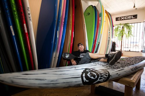 MIKE DEAL / WINNIPEG FREE PRESS Scott Hopper owner of Hardcore Surf & Paddleboard Company, 211 Pacific Ave. in Chinatown.  160620 - Monday, June 20, 2016