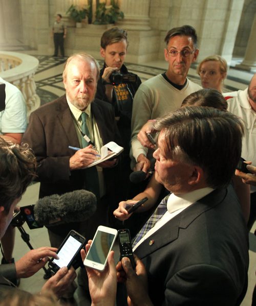 BORIS MINKEVICH / WINNIPEG FREE PRESS Manitoba Education Minister Ian Wishart scummed by the media Monday afternoon. June 20, 2016.