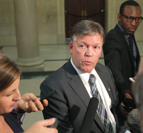 BORIS MINKEVICH / WINNIPEG FREE PRESS Manitoba Education Minister Ian Wishart scummed by the media Monday afternoon. June 20, 2016.