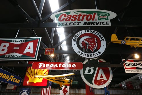 WAYNE GLOWACKI / WINNIPEG FREE PRESS    Gas station signage, part of Burt Barkman's lifelong collection of gas station items in his hangar. He is selling everything at this Sunday morning at an auction held in his hangar at Lyncrest Airport. Randy Turner story  June 21  2016