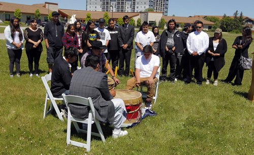 BORIS MINKEVICH / WINNIPEG FREE PRESS Drummers at the ceremony for the official ground breaking of the new Southwest Collegiate school that is going to be built on the Lee Blvd location.  In behind is the graduating class of 2016 from Southeast Collegiate. June 21, 2016.