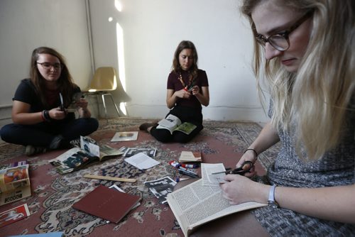 JOHN WOODS / WINNIPEG FREE PRESS (From left)  Gillian Toothill, Gabrielle Funk and Natasha Havrilenko work on their zine Rip/Torn in their studio Tuesday, June 21, 2016.  For a feature on Winnipeg zines.