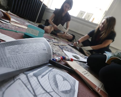 JOHN WOODS / WINNIPEG FREE PRESS (From left) Meganelizabeth Diamond and Gillian Toothill work on their zine Rip/Torn in their studio Tuesday, June 21, 2016.  For a feature on Winnipeg zines.