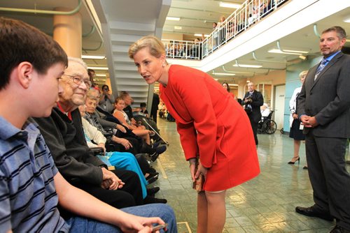 RUTH BONNEVILLE / WINNIPEG FREE PRESS  Countess of Wessex chats with Fifteen year old Terry Barber, a volunteer at Deer Lodge and his grandfather's friend, John Wirth (to his left),  while she visits with residents and veterans during tour of centre on celebration of its 100th birthday Wednesday.   June 22 / 2016