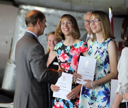 BORIS MINKEVICH / WINNIPEG FREE PRESS Prince Edward gives out the Duke of Edinburgh Award to Claire and Angela Woodbury at the Royal Aviation Museum of Western Canada. June 22, 2016.