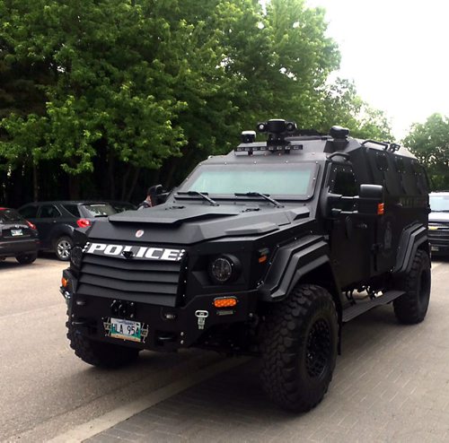 BORIS MINKEVICH / WINNIPEG FREE PRESS Winnipeg police unveil the new Gurkha armoured vehicle purchased by the Winnipeg Police Service at a press event in Assiniboine Park. June 22, 2016.
