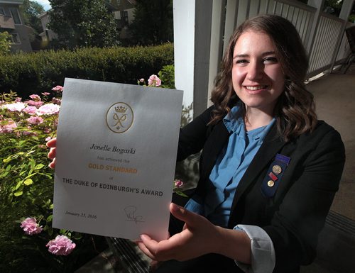 PHIL HOSSACK / WINNIPEG FREE PRESS -  Jenelle Bogaski poses at home with her Duke of Edinburgh's Award Wednesday evening. See story. June 22, 2016