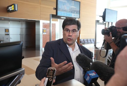 RUTH BONNEVILLE / WINNIPEG FREE PRESS  NewLeaf Travel CEO Jim Young holds press conference at Richardson International Airport Thursday.  June 23 / 2016