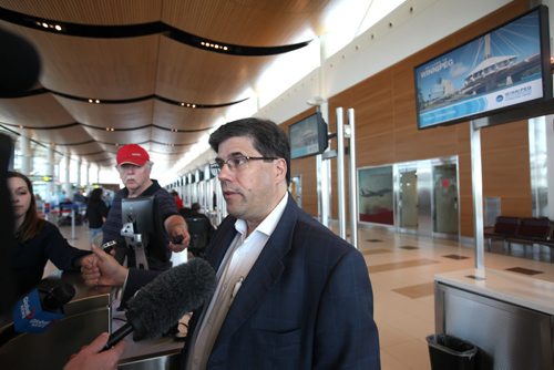 RUTH BONNEVILLE / WINNIPEG FREE PRESS  NewLeaf Travel CEO Jim Young holds press conference at Richardson International Airport Thursday.  June 23 / 2016