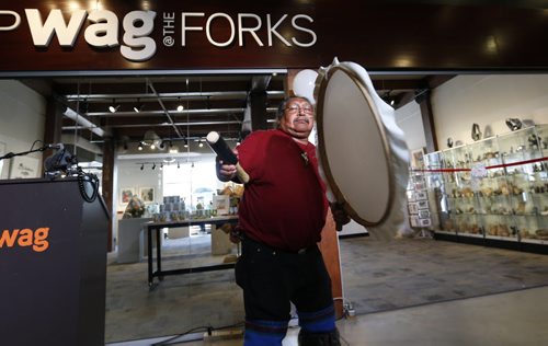 WAYNE GLOWACKI / WINNIPEG FREE PRESS   Mathew Nuqingaq, a jeweller from Iqaluit performs a drum dance in front of the new WAG@The Forks on Thursday, the Gallery Shops new satellite location at the Johnston Terminal. (He has jewelry in the new shop.) This was the sneak preview for members and media, it opens to the public on Saturday. Aidan story June 23  2016