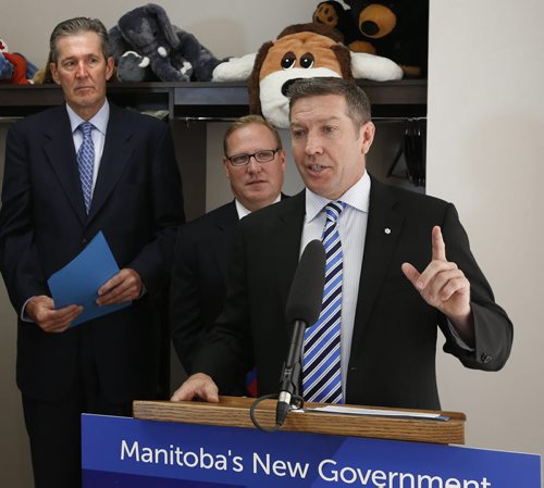WAYNE GLOWACKI / WINNIPEG FREE PRESS   Sheldon Kennedy, with the Sheldon Kennedy Child Advocacy Centre and co-founder the Respect Group speaks at a news conference held by Premier Brian Pallister at left and Families Minister Scott Fielding. The provincial gov't gave details of new legislation to better protect children in Manitoba at at news conference held Thursday at the Snowflake Place for Children and Youth. Larry Kusch story June 23  2016