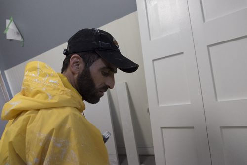 ZACHARY PRONG / WINNIPEG FREE PRESS  Mahmoud Almasalmeh, who was also a painter in Syria, at work on June 15, 2016.