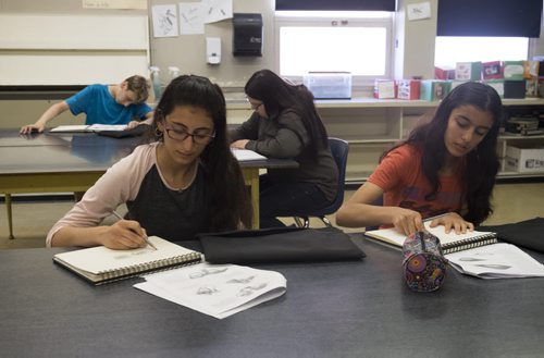 ZACHARY PRONG / WINNIPEG FREE PRESS  (L-R) Roha Souleyman, 14, and her sister Rena, 12, at school on June 15, 2016.