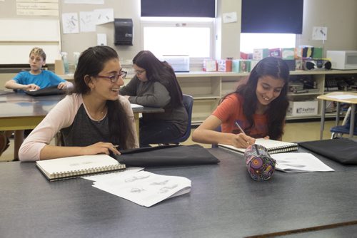 ZACHARY PRONG / WINNIPEG FREE PRESS  (L-R) Roha Souleyman, 14, and her sister Rena, 12, at school on June 15, 2016.