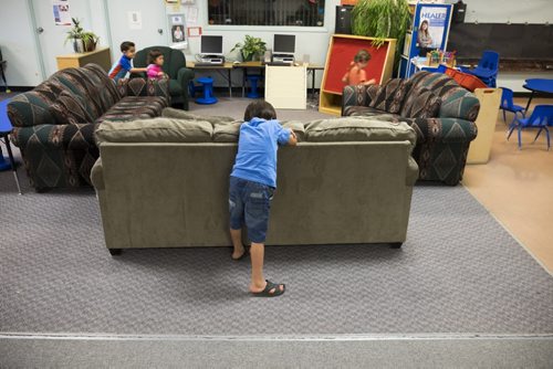 ZACHARY PRONG / WINNIPEG FREE PRESS  The children of the three families play hide and seek at a community centre where their parents study English each week. June15, 2016.