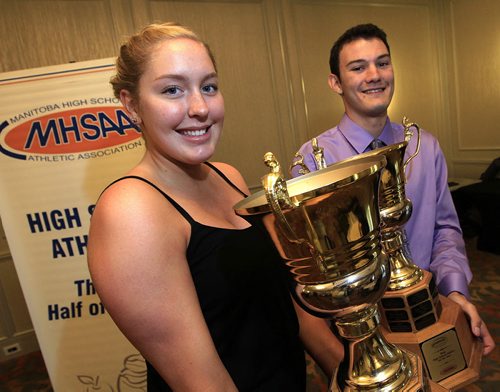 PHIL HOSSACK / WINNIPEG FREE PRESS - MHSAA Athletes of the Year  Keylyn Filewich of Vincent Massey Collegiate in Winnipeg (left) and Matthew Klassen of Genboro School pose with the hardware Friday after being presented thier honors.  - See story. June 24, 2016