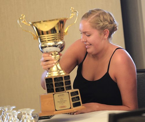 PHIL HOSSACK / WINNIPEG FREE PRESS - MHSAA Athlete of the Year  Keylyn Filewich of Vincent Massey Collegiate in Winnipeg  embraces her trophy Fiday after the presentation.  - See story. June 24, 2016