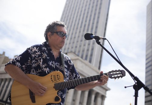 ZACHARY PRONG / WINNIPEG FREE PRESS  Marco Castillo, a Winnipeg based musician originally from Brazil, performs during the Cultural Corner, part of the Imagine Portage and Main Pop-up Series that will take place throughout the summer. Castillo and other artists from Folklorama Talent were playing on each corner of the downtown intersection on June 24, 2016. Organized by the City of Winnipeg, the Downtown Winnipeg BIZ, and the Exchange District BIZ, the Pop-up events will happen once each month and will include a farmers market, beer festival and dance party.