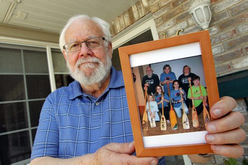 BORIS MINKEVICH / WINNIPEG FREE PRESS Volunteers column for the June 27 issue is about Hal Studholme. Hal is a long-time volunteer with the Y as well as Camp Stephens, the summer camp it operates in Lake of the Woods.  Here he poses with a photo of his kids, grand kids, and great grand kid in a camp photo(L-R top - Hal Studholme. Bruce Fiske. Terri Fiske.  Back L-R - Grandkid Shaye Fiske. grandkid Dylan Fiske.  Great grand kid Caitlyn Hart. Grandchild Wyatt Fiske). June 24, 2016.