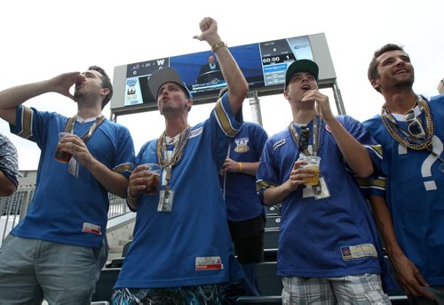 JOE BRYKSA / WINNIPEG FREE PRESS Bomber/Jets fans L to R Justin Rowank, Cory Hiebert, and Bryce Gauthier, Adam Vandal  heckle NHL commissioner Gary Bettman as the draft is up on the big screen at Investors Group Field   . -June 24, 2016  -(See story)