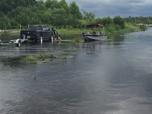 Joe Bryksa / Winnipeg Free Press Cottagers trying to get boats out at Falcon Lake. Saturday, June 25, 2016