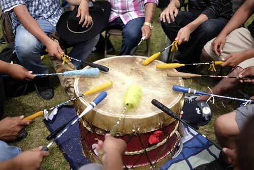 ZACHARY PRONG /  WINNIPEG FREE PRESS  A men's drum circle performs during the Aboriginal Day Live Pow Wow Competition on June 25, 2016.