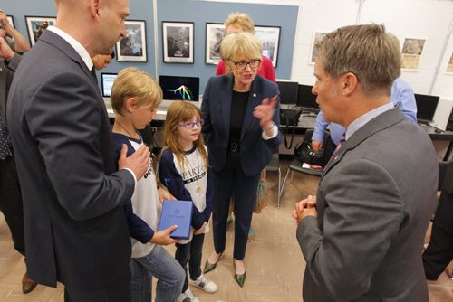 BORIS MINKEVICH / WINNIPEG FREE PRESS L-R Luxton Elementry School's James Mushaluk, and Cooper Vint chat with Winnipeg School Division 1 Chief Superintendant Pauline Clarke and MB Minister of Finance Cameron Friesen at Sisler Highschool where a government credit program was announced. June 27, 2016.
