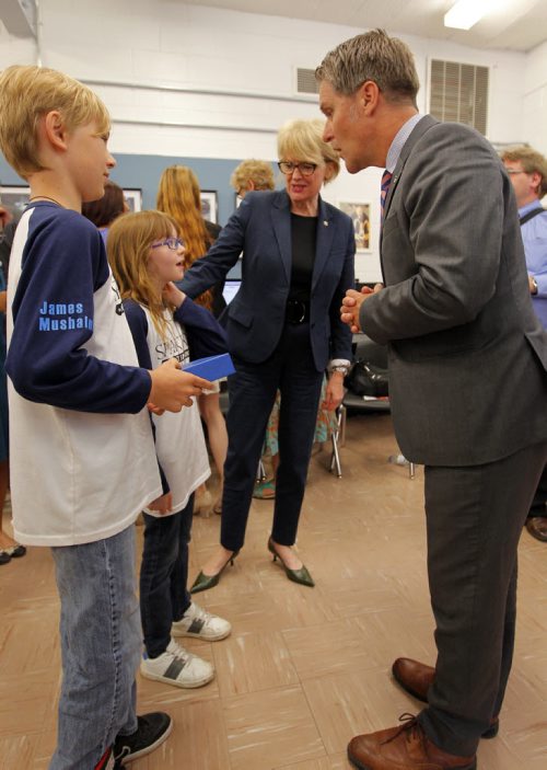 BORIS MINKEVICH / WINNIPEG FREE PRESS L-R Luxton Elementry School's James Mushaluk, and Cooper Vint chat with Winnipeg School Division 1 Chief Superintendant Pauline Clarke and MB Minister of Finance Cameron Friesen at Sisler Highschool where a government credit program was announced. The kids are doing award winning work in coding and gaming and will benefit eventually take advantage of the new tax credit program. June 27, 2016.