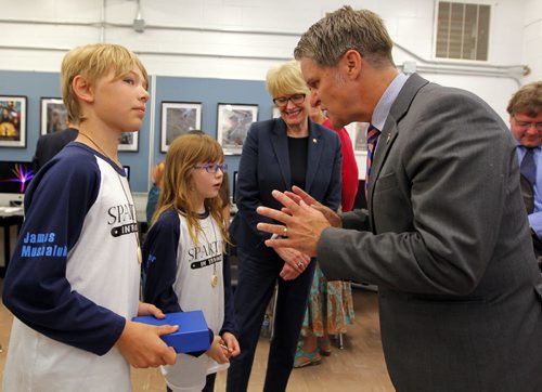 BORIS MINKEVICH / WINNIPEG FREE PRESS L-R Luxton Elementry School's James Mushaluk, and Cooper Vint chat with Winnipeg School Division 1 Chief Superintendant Pauline Clarke and MB Minister of Finance Cameron Friesen at Sisler Highschool where a government credit program was announced. The kids are doing award winning work in coding and gaming and will benefit eventually take advantage of the new tax credit program. June 27, 2016.