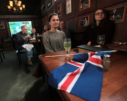 PHIL HOSSACK / WINNIPEG FREE PRESS -  Karyn Suchy (center) and Alicia Sylvester  watch Icland and England's soccer match at Gimli's Ship and Plough. See Randy Turner's story.  - See story. June 27, 2016