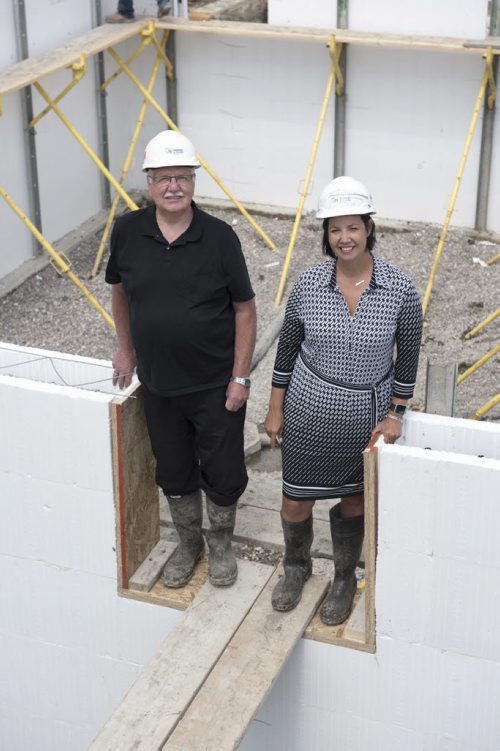 DAVID LIPNOWSKI / WINNIPEG FREE PRESS   Project coordinator of St. Vital interfaith habitat build Alf Horn, and Vice President communications and philanthropy Michelle Pereira on site where the basement is being poured on Ross Ave. W. Monday June 27, 2016.