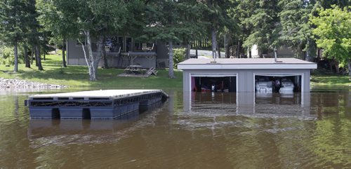WAYNE GLOWACKI / WINNIPEG FREE PRESS  Flooded boat house along Caddy Lake Monday.  Bill Redekop Story June 27  2016