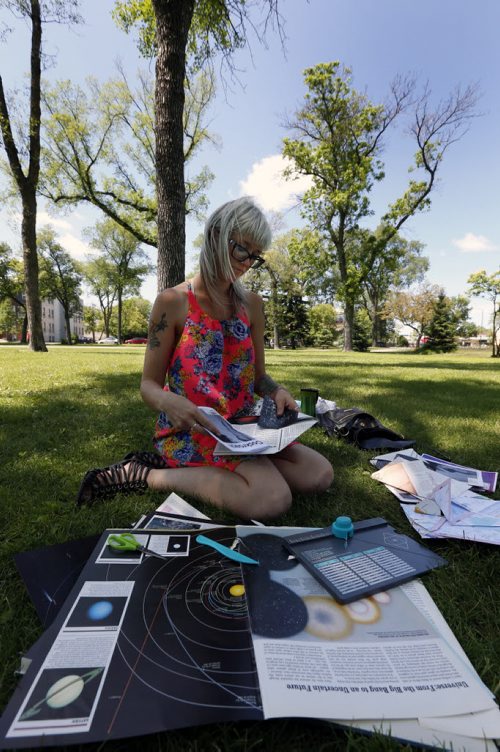 WAYNE GLOWACKI / WINNIPEG FREE PRESS  49.8 ZINES.  Meg Crane is the creator of a local zine called Cockroach, and likes to make her zines/envelopes in Vimy Ridge Park . Aidan Geary Story June 28  2016