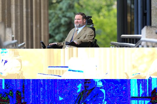 RUTH BONNEVILLE / WINNIPEG FREE PRESS  Assiniboia MLA Steven Fletcher, stops at the top of the ramp outside the Legislative Building Tuesday morning after challenging plans for renovating the chamber to accommodate wheelchair access.  Feature photo for story.   See Larry Kusch story.    June 28 / 2016