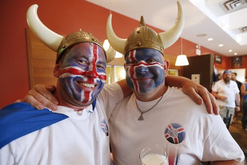 JOHN WOODS / WINNIPEG FREE PRESS Iceland fans Kristinn Traustason and Haukur Gunnarsson at the Lakeview Hotel in Gimli support their team as they battle France in the Euro Cup Sunday, July 3, 2016.