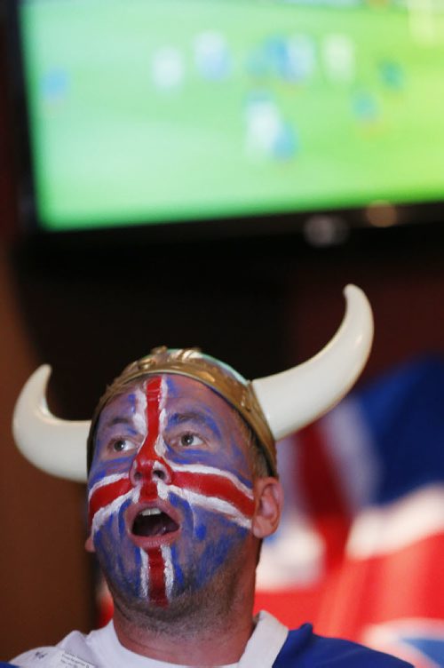 JOHN WOODS / WINNIPEG FREE PRESS Iceland fan Kristinn Traustason at the Lakeview Hotel in Gimli reacts as France scores against his team as they battle in the Euro Cup Sunday, July 3, 2016.