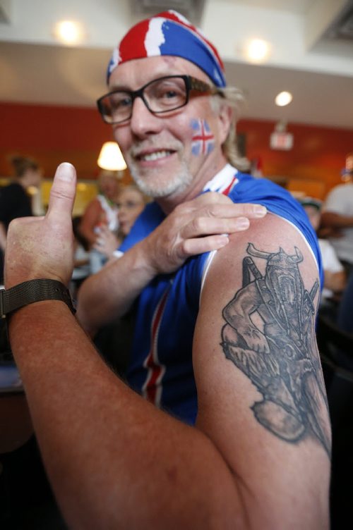 JOHN WOODS / WINNIPEG FREE PRESS Iceland fan Brian Thompson with an Icelandic tattoo at the Lakeview Hotel in Gimli supports his team as they battle France in the Euro Cup Sunday, July 3, 2016.