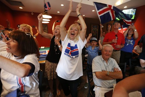 JOHN WOODS / WINNIPEG FREE PRESS Iceland fans at the Lakeview Hotel in Gimli cheer as their team scores on  France in the Euro Cup Sunday, July 3, 2016.